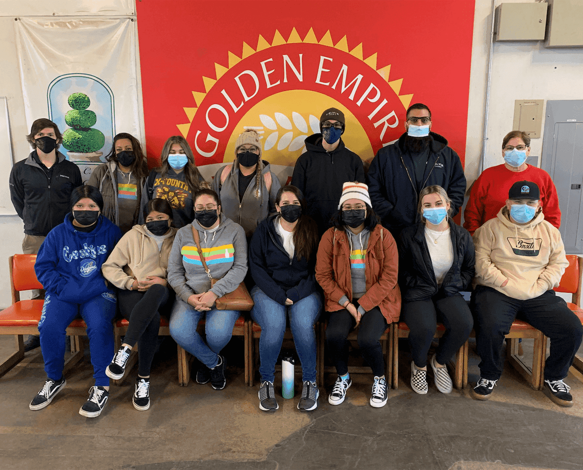 a group of people smiling for a photo